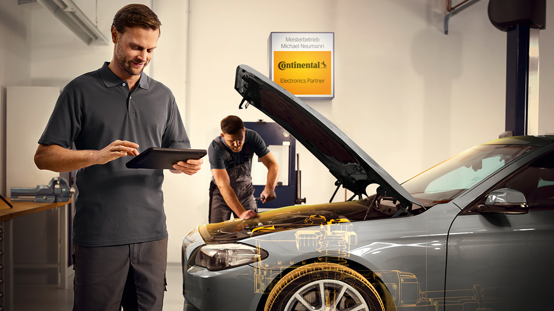 CON 2020 Motiv 02 Werkstattloesungen Mit Schild